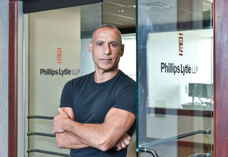 Rich Honen outside the doors of Phillips Lytle