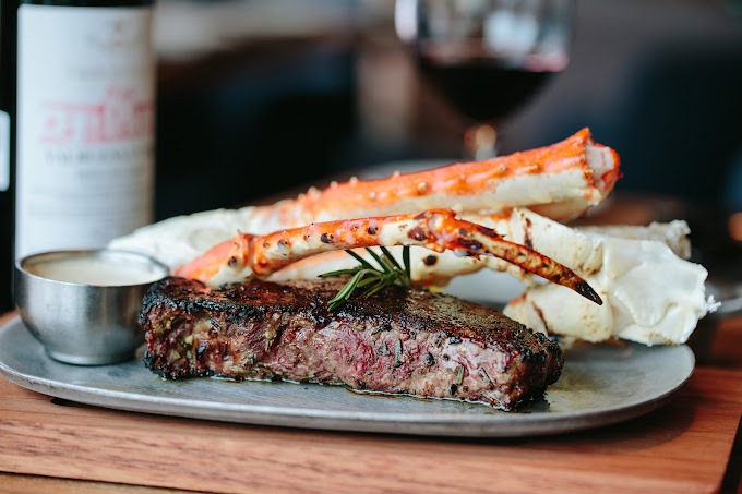 Black & Blue Steak and Crab, steak and crab legs on a plate